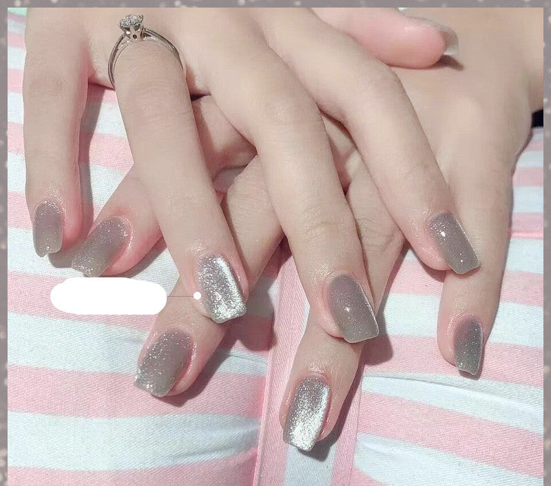 Milk tea crystal stone cat eye nail polish bottle with shimmering beige magnetic effect