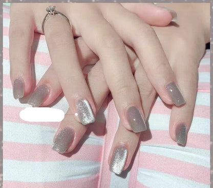 Milk tea crystal stone cat eye nail polish bottle with shimmering beige magnetic effect