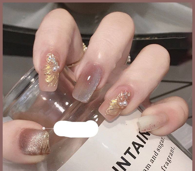 Milk tea crystal stone cat eye nail polish bottle in a shimmering neutral shade
