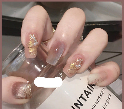 Milk tea crystal stone cat eye nail polish bottle in a shimmering neutral shade