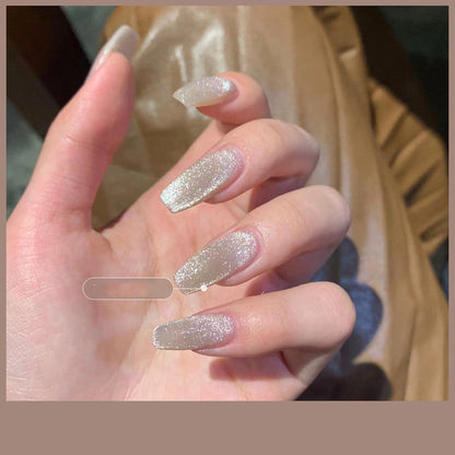 Milk tea crystal stone cat eye nail polish bottle with shimmering brown finish