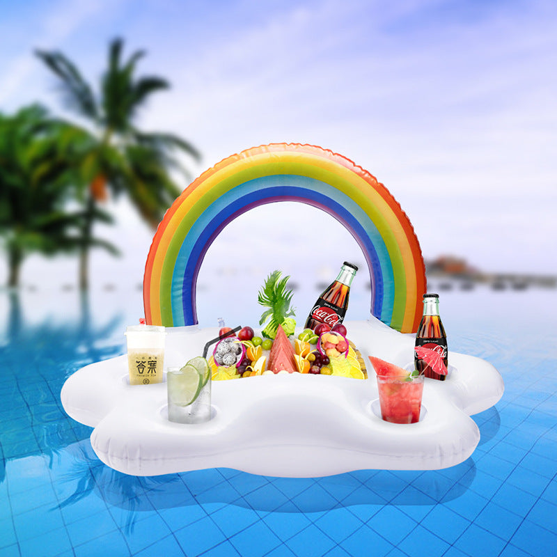 Inflatable rainbow toy cup holder floating on water