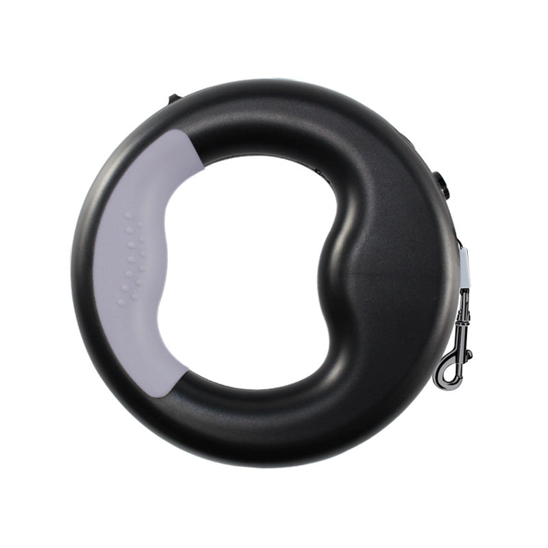 Cute retractable dog leash for pets, compact handheld design with durable cord and ergonomic grip