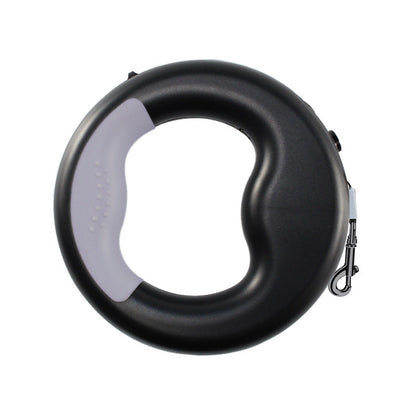 Cute retractable dog leash for pets, compact handheld design with durable cord and ergonomic grip