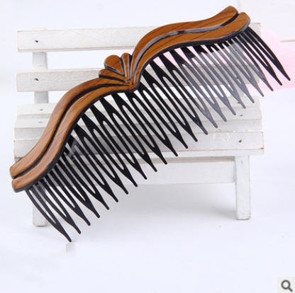Retro fashion hair comb with decorative vintage-inspired design