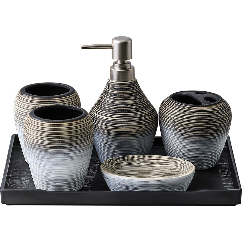 Retro brushed bathroom wash set in antique brass finish with basin tap, waste, and water supply hoses