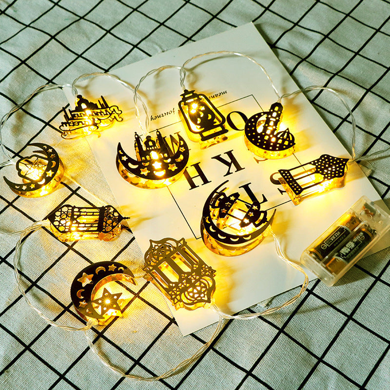 Ramadan decorations featuring a glowing moon and star LED light display
