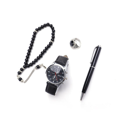 Boutique gift set with ring, rosary, quartz watch, and pen displayed together