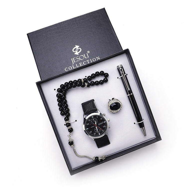Boutique gift set with ring, rosary, quartz watch, and pen in a coordinated presentation box