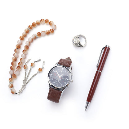 Boutique gift set with quartz watch, ring, rosary, and pen in a coordinated presentation