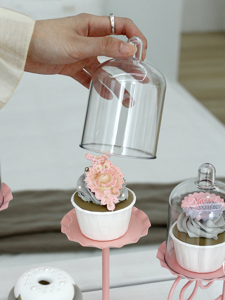 Pink wedding dessert table cake stand displayed for event dessert presentation