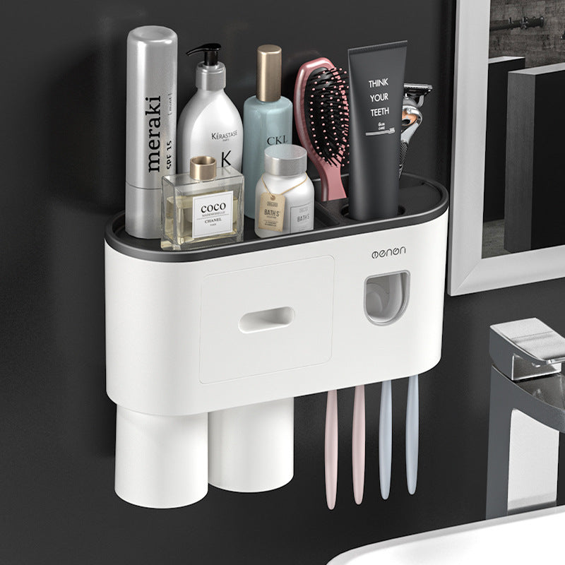 Hanging magnetic toothbrush holder with single drawer, toothpaste squeezer, and toiletry storage rack