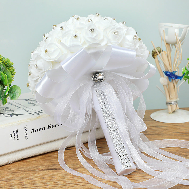 Handmade artificial wedding bouquet with realistic rose flowers in a romantic floral arrangement