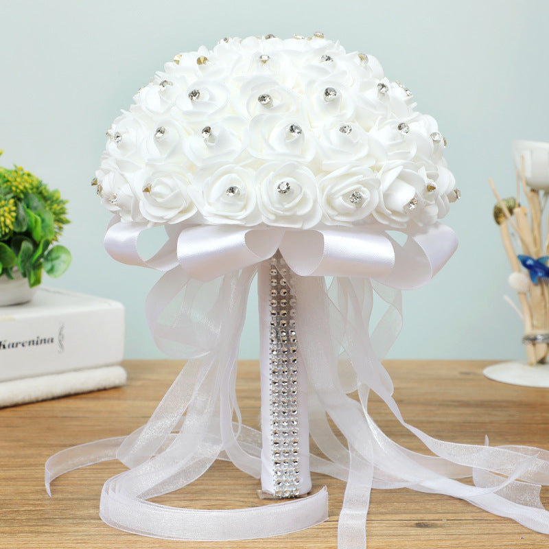 Handmade artificial wedding bouquet with lifelike rose flowers in a romantic floral arrangement