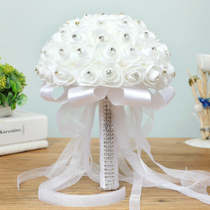 Handmade artificial wedding bouquet with lifelike rose flowers in a romantic floral arrangement
