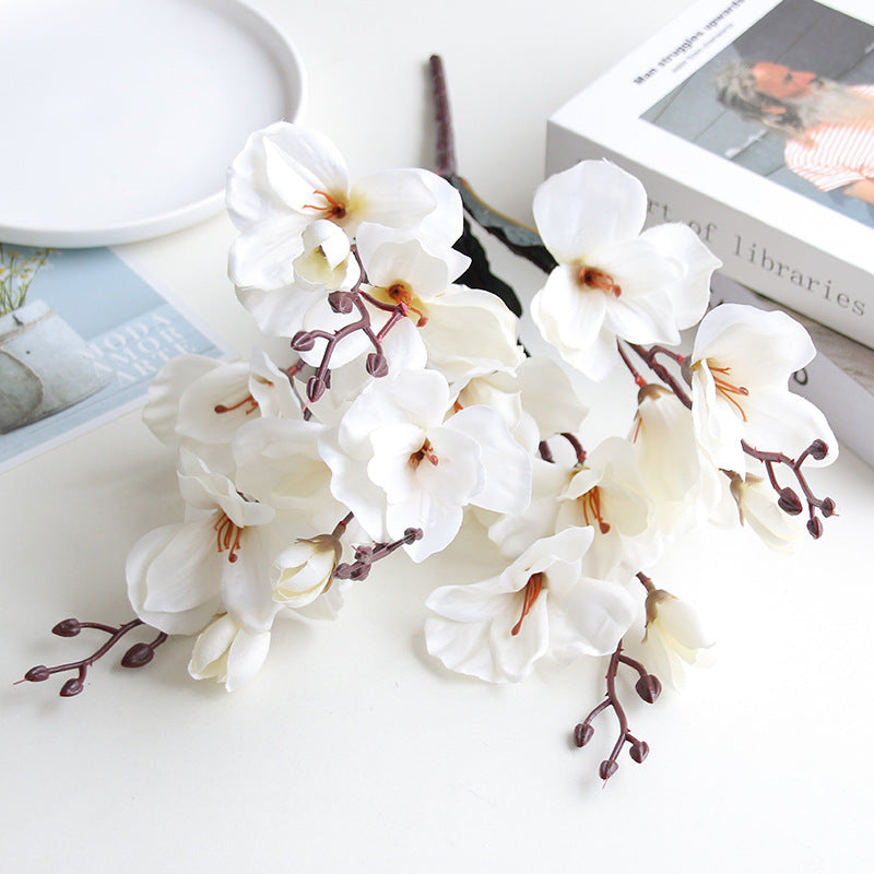 Artificial flowers arranged as home decoration and wedding photography props.