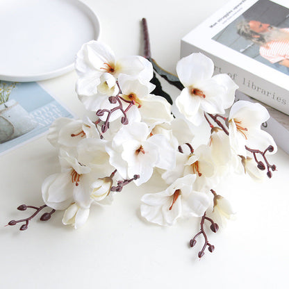 Artificial flowers arranged as home decoration and wedding photography props.