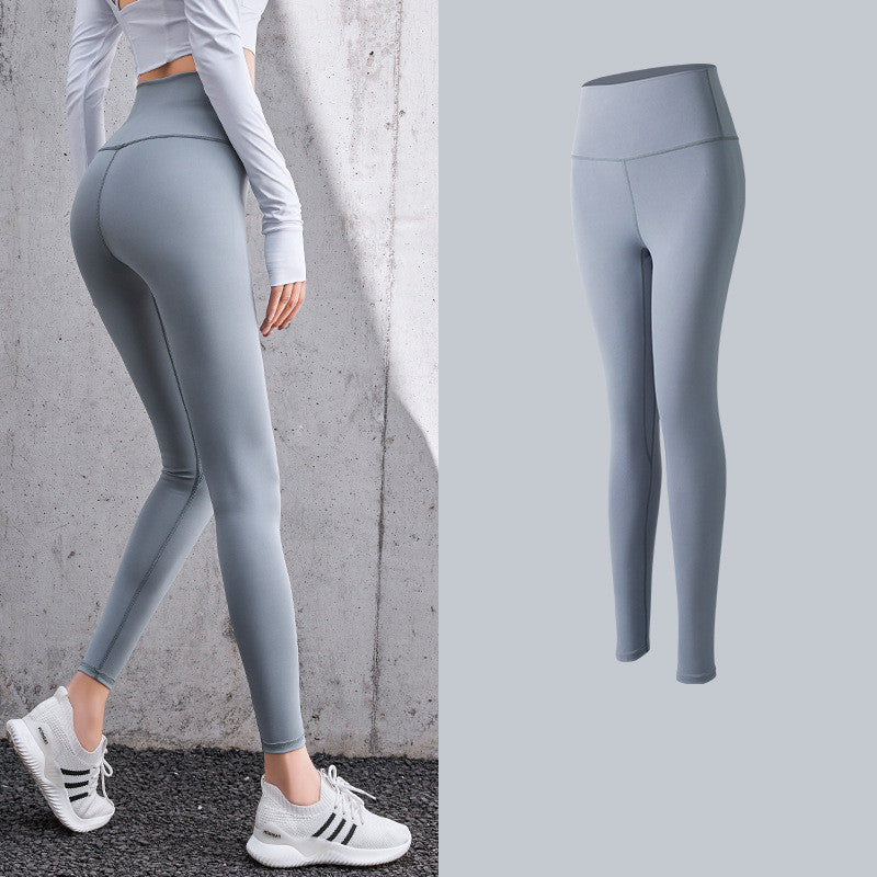 High waist skinny peach hip leggings for fitness, showing a sleek, body-contouring design