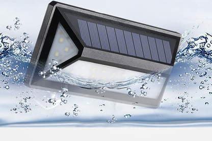 Solar wall light with modern outdoor design mounted on an exterior wall