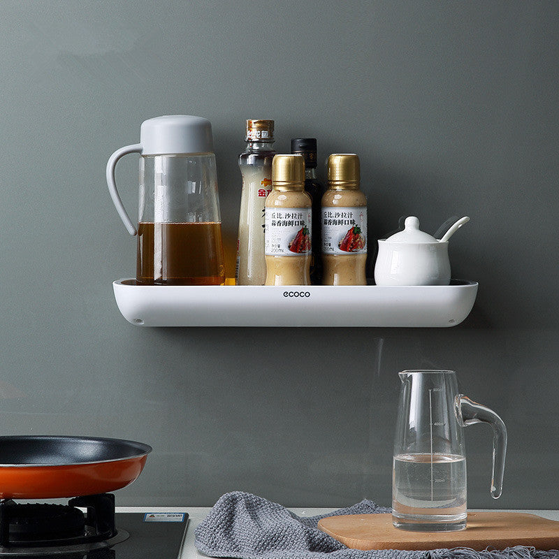 Wall-mounted bathroom storage rack for organizing toiletries and kitchen essentials