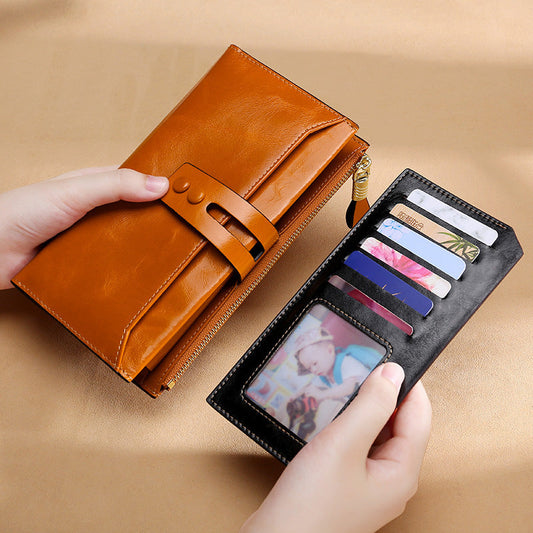Women's retro long oil wax leather wallet with multiple card slots and buckle closure