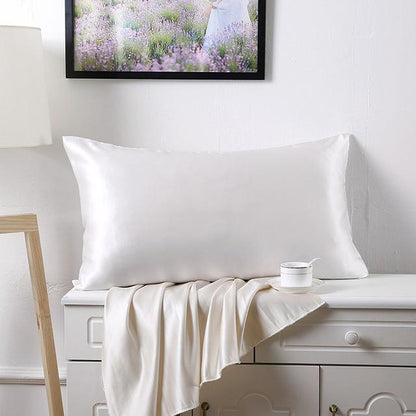 Double-sided 19 momme silk pillowcase in smooth, lustrous fabric, shown in a folded view