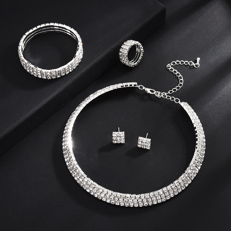 Exaggerated claw diamond beaded four-piece set multilayer necklace with layered beaded chains and claw details