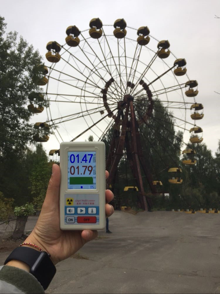 Nuclear radiation detector Geiger counter for measuring ionizing radiation, front view with digital display