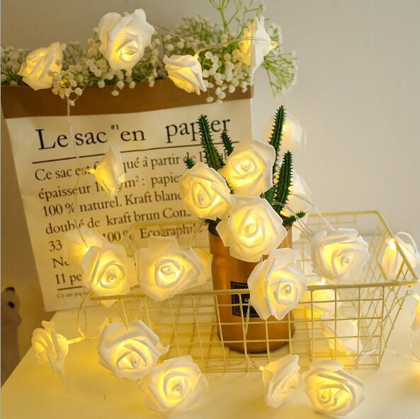 LED rose flower lights with glowing rose-shaped bulbs and green stems by My Store