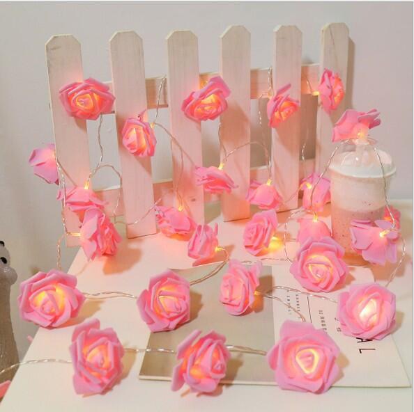 LED rose flower lights with glowing rose-shaped blooms on flexible stems
