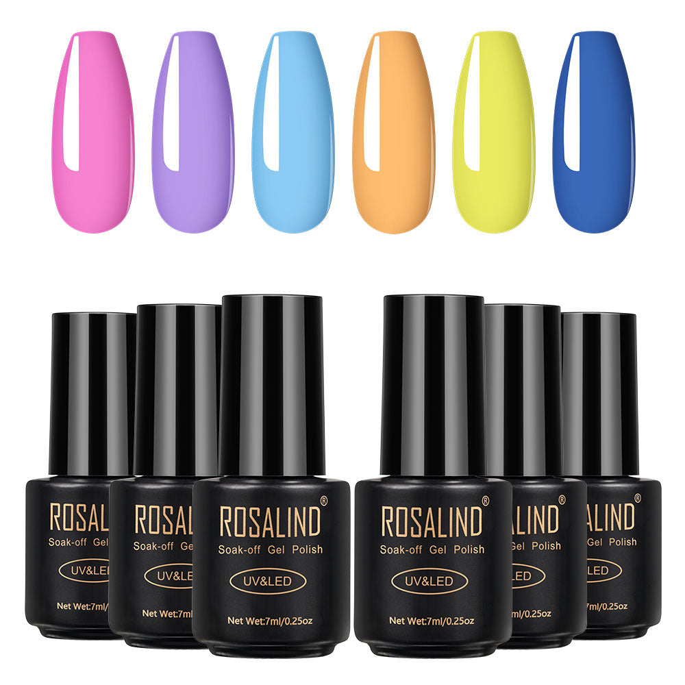 Six bottles of Fine nail polish in assorted shades displayed together