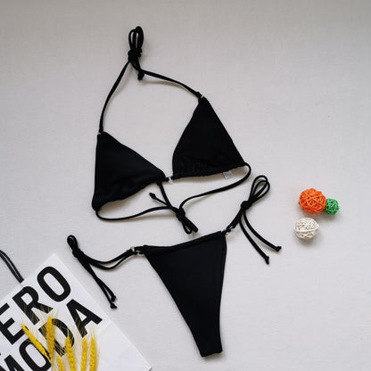 Multicolor split bikini swimsuit with halter tie design and vibrant color-block pattern