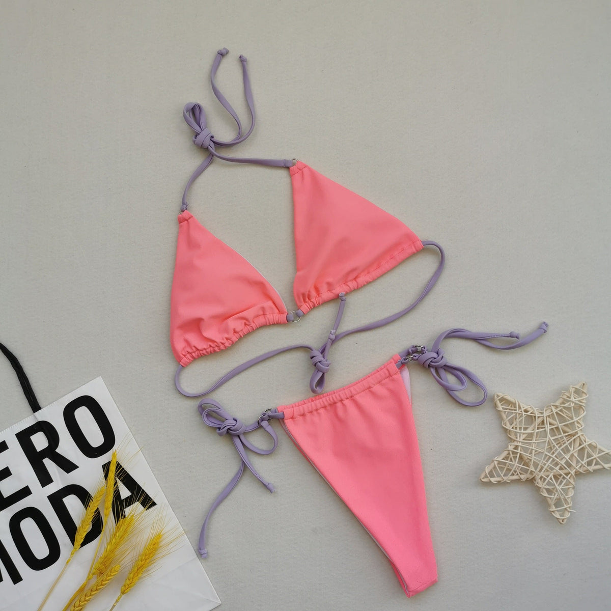 Multicolor sexy split bikini swimsuit with halter neck and tie details, front view