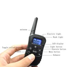 Anti-barking dog trainer with shock and vibration bark control features, black handheld device with display