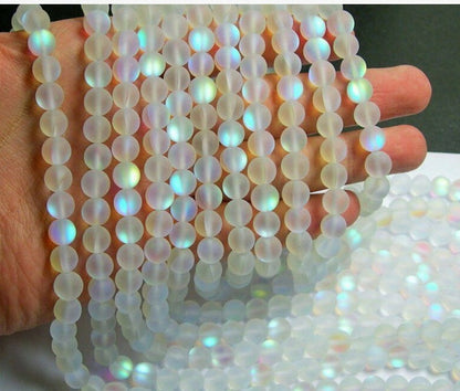 Mystic Aura Quartz gemstone loose beads in iridescent purple and blue tones