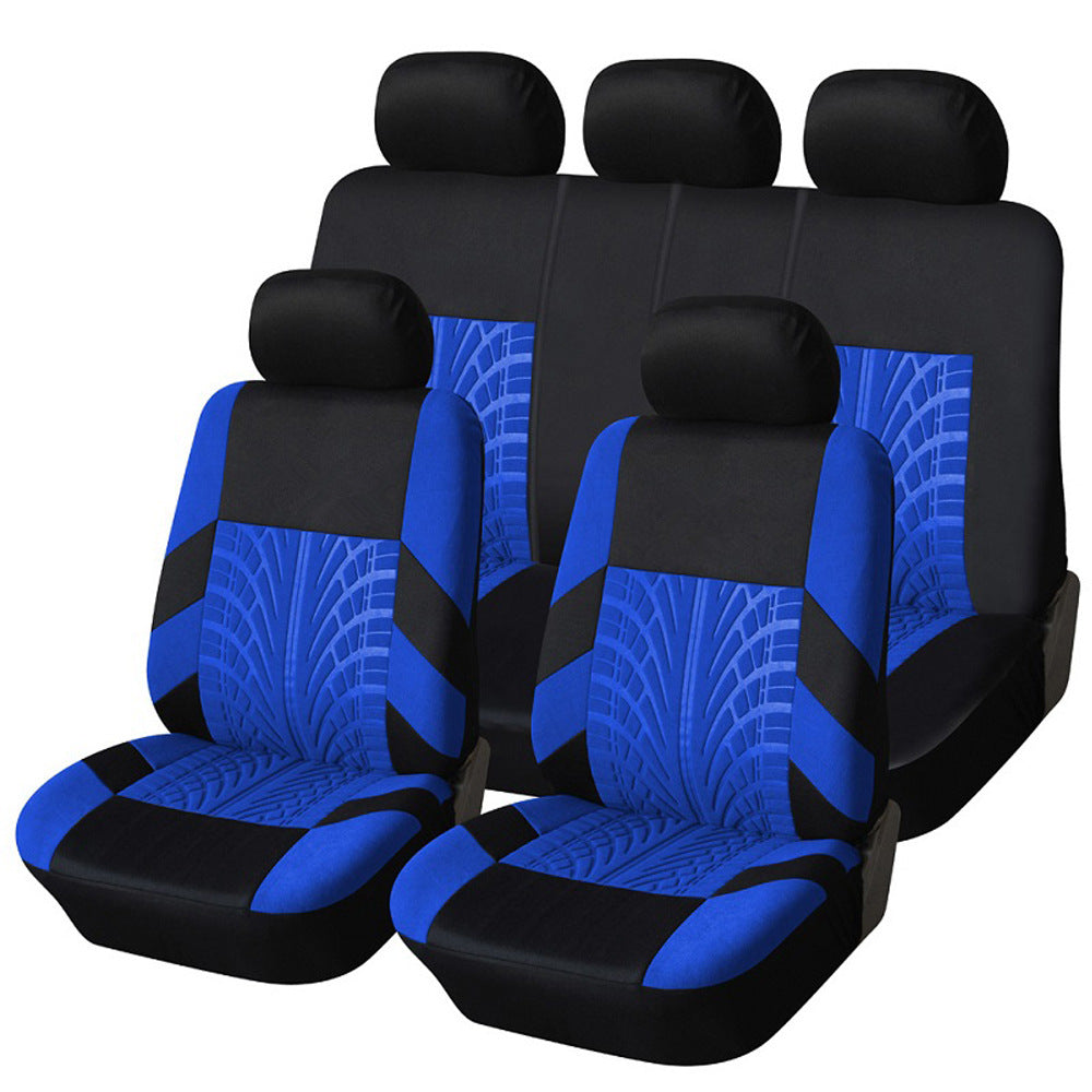 General Motors seat cover in black, shown from the front with fitted design and headrest openings