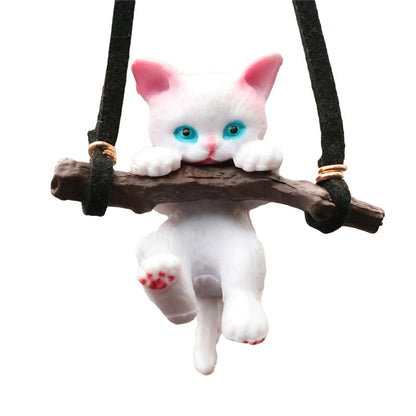 Cute branch cat car ornament pendant hanging from a rearview mirror