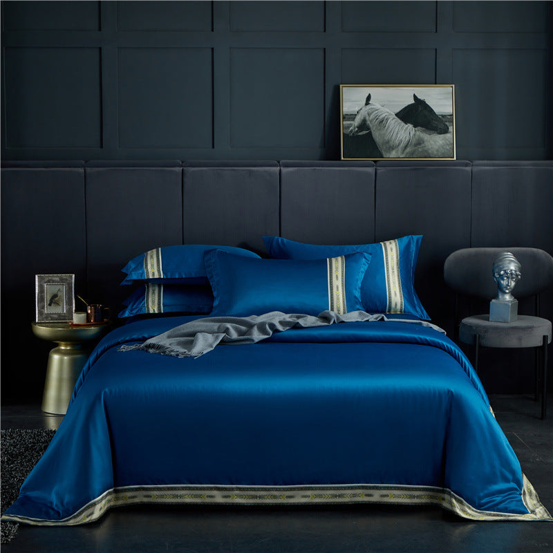 Four-piece washed silk satin striped sheet set in solid ice silk bedding fabric