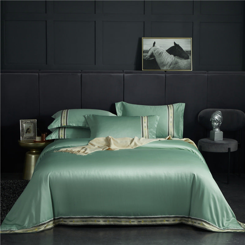 Four-piece washed silk satin striped sheet set in solid ice silk fabric with smooth Jane Ou silk finish