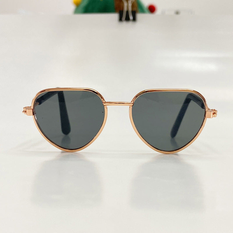Mini pet cat sunglasses in a creative fashion design, shown from the front