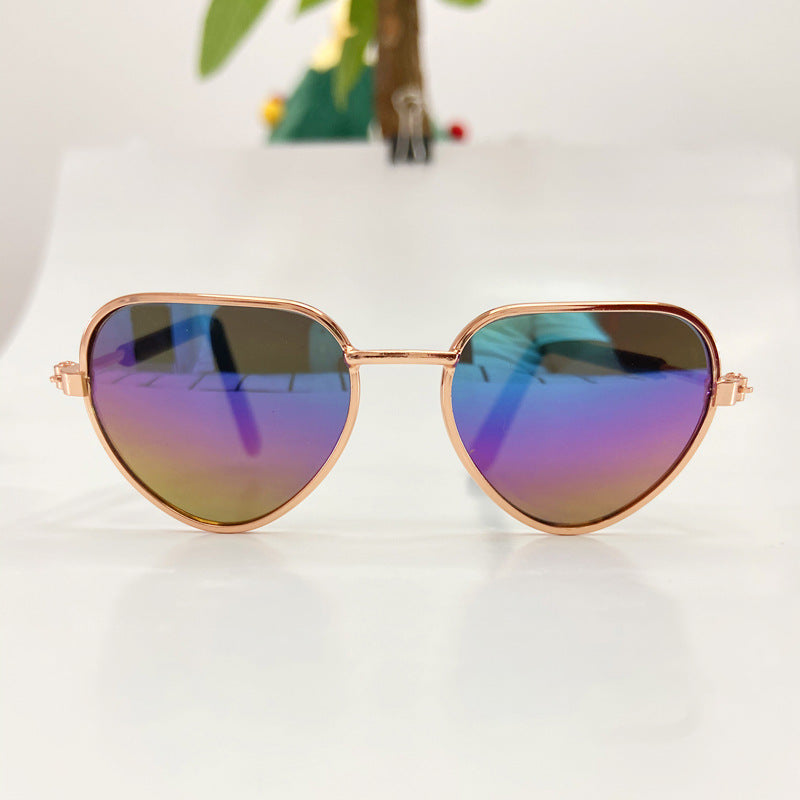 Creative fashion mini pet cat sunglasses with playful frame design for cats, shown against a plain background