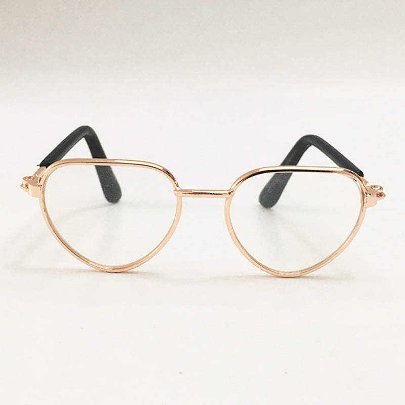Creative fashion mini pet cat sunglasses in a playful design for small cats' eyes
