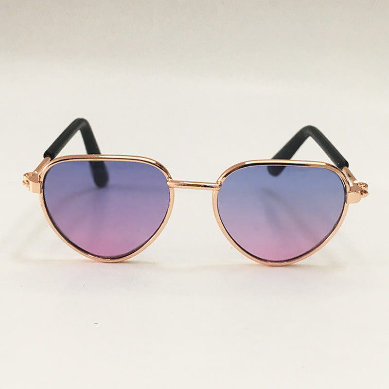 Creative fashion mini pet cat sunglasses in a black frame for small cats, close-up product view