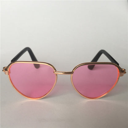 Creative fashion mini pet cat sunglasses in a playful design, front view