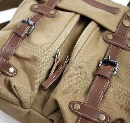 Casual canvas SLR camera bag with adjustable shoulder strap and protective padded compartments