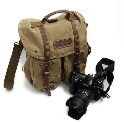 Casual canvas SLR camera bag with adjustable shoulder strap and protective padded compartments