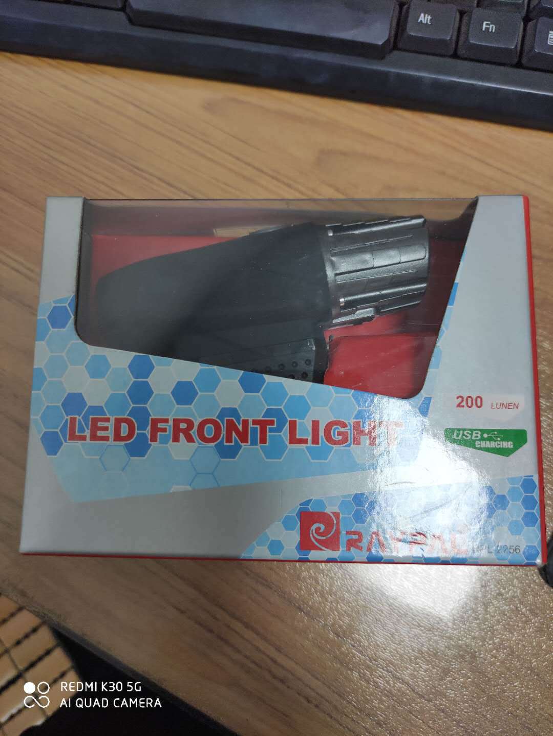 Rechargeable USB bicycle headlights and taillights mounted on a mountain bike, featuring strong front and rear lights