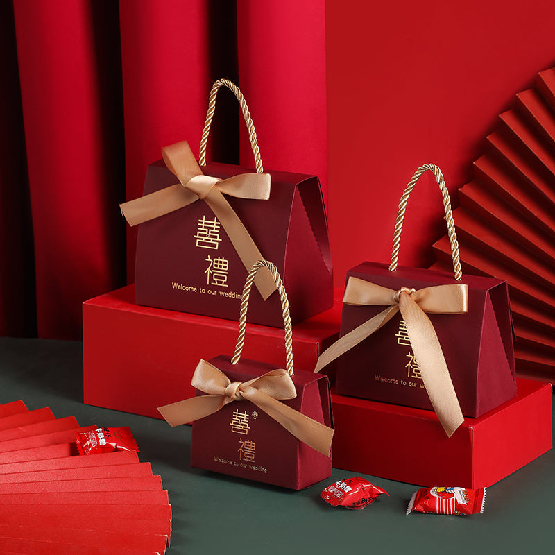 Portable Chinese style wedding candy gift box in decorative red design