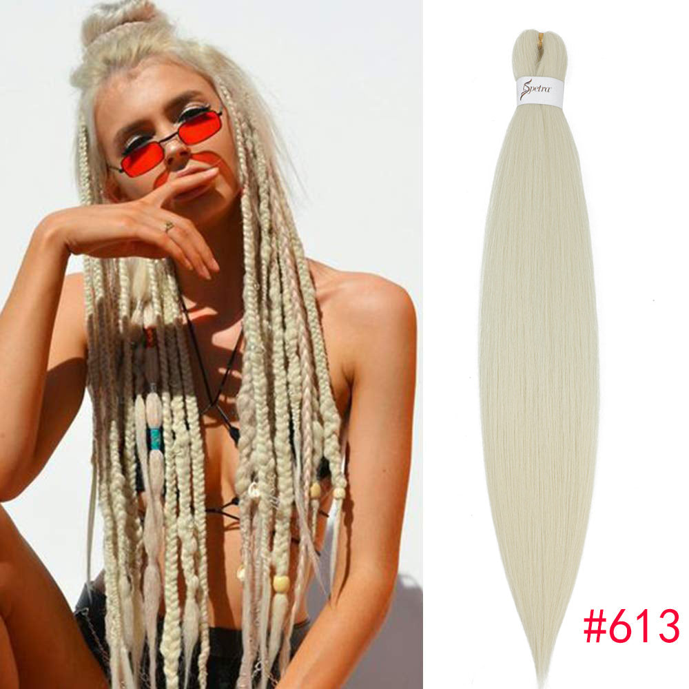 PVC low temperature flame retardant fluffy pull block big braid styling wig in close-up view