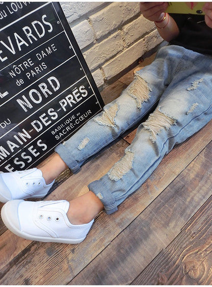 Korean style boys ripped trousers in casual denim design